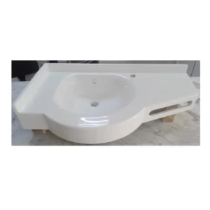 Lavabo d'angle PMR avec cuve déportée à gauche pour accessibilité fauteuil